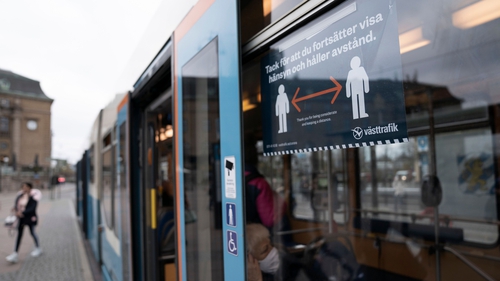 Commuters are reminded to keep their distance on a tram in Gothenburg, Sweden
