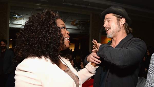 Oprah Winfrey and Brad Pitt (pictured at an event in Beverly Hills in January 2015) - Bringing bestseller to big screen