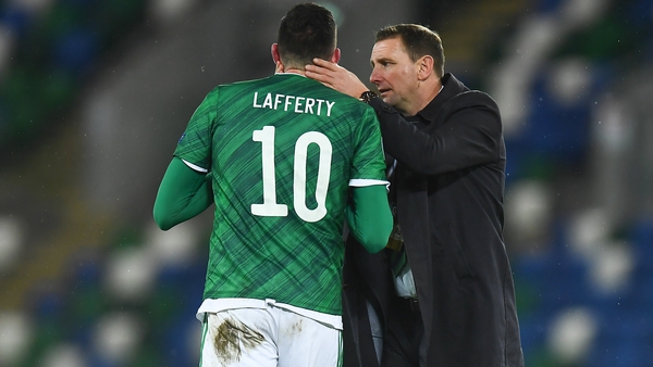 Northern Ireland boss Ian Baraclough consoles Kyle Lafferty at Windsor Park