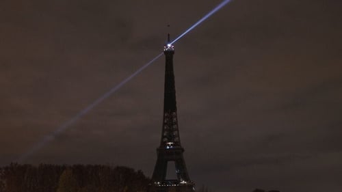 The lights of the Eiffel tower are switched off to pay tribute to the victims