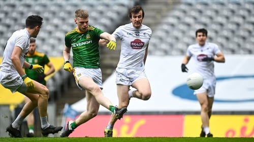 Mathew Costello of Meath scores his side's first goal despite the attention of Paddy Brophy of Kildare