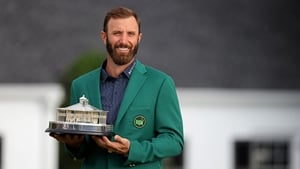 Dustin Johnson poses with the Masters Trophy during the Green Jacket Ceremony