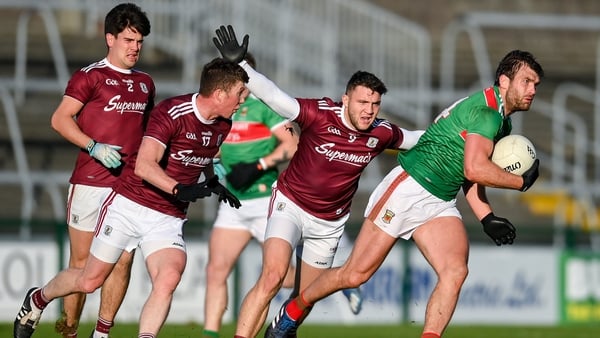 Aidan O'Shea of Mayo in action against Damien Comer of Galway during the Connacht final