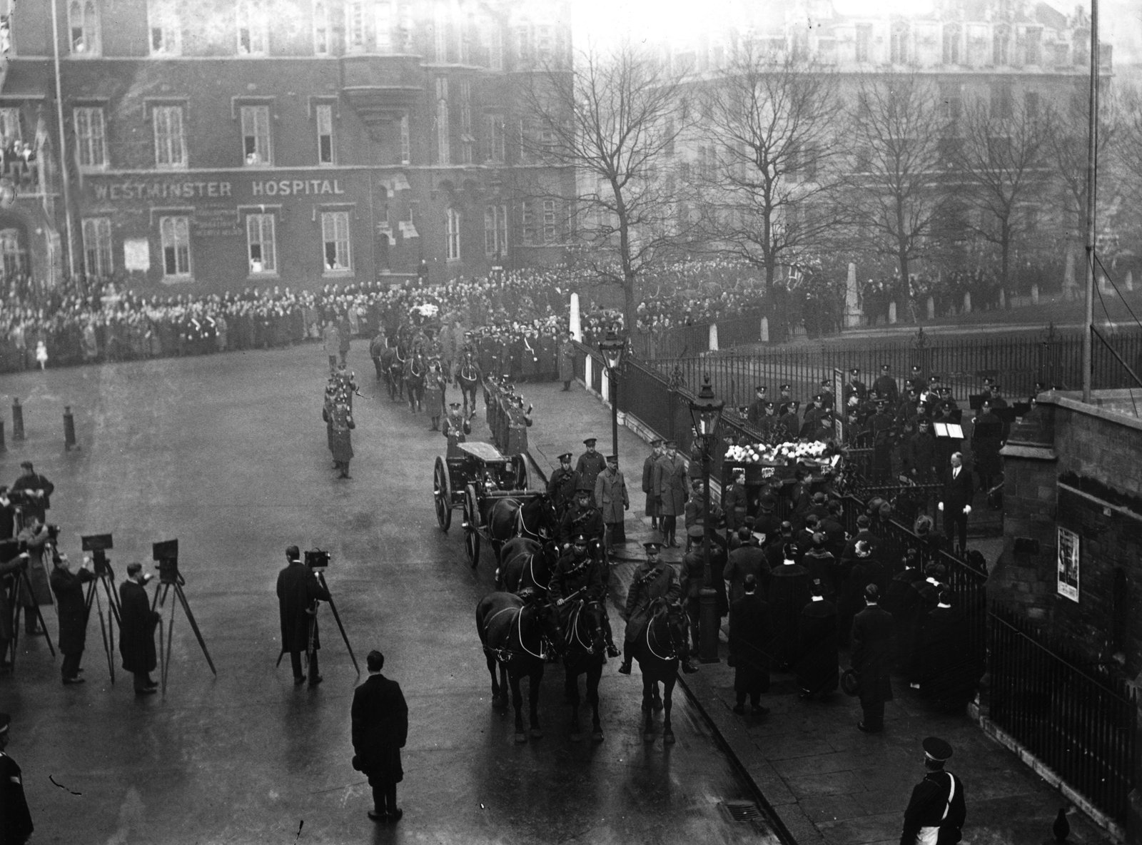 Image - A funeral procession for the British officers killed in Dublin on Bloody Sunday arrives at Westminster Abbey in London. (Photo by A. R. Coster/Topical Press Agency/Getty Images)