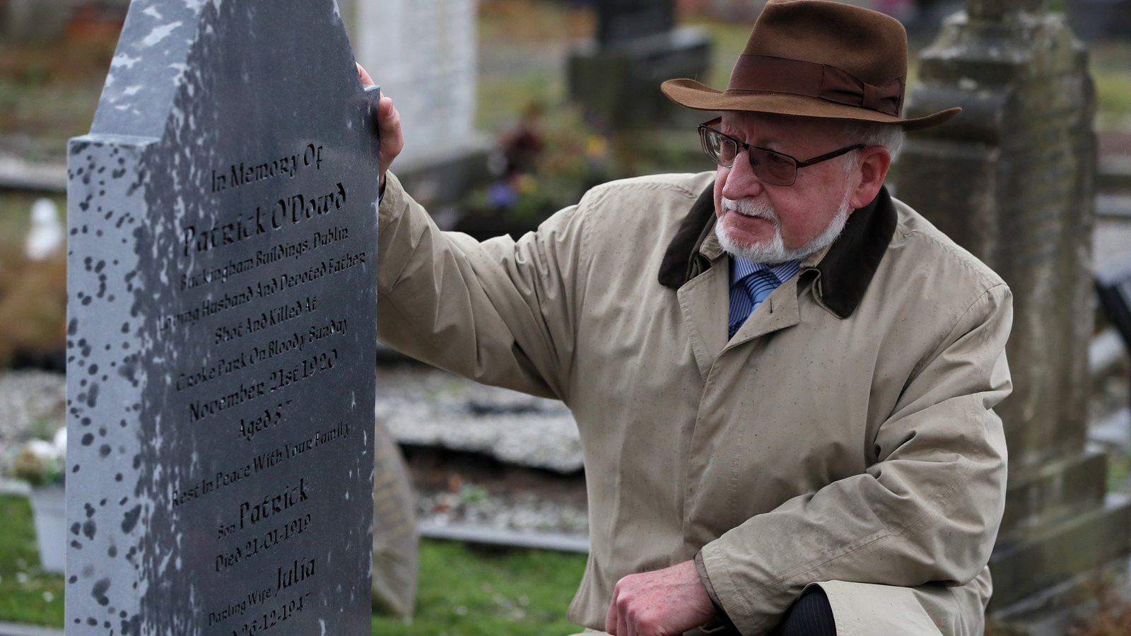 Image - Patrick O'Dowd headstone, Glasnevin Cemetery, with Grandnephew Liam Dineen, Wednesday 20 November 2019 (Credit: PA)
