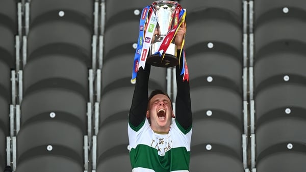 Conor Sweeney lifts the Munster cup