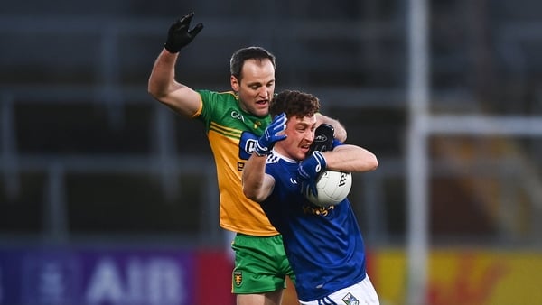 Ciaran Brady of Cavan in action against Michael Murphy of Donegal