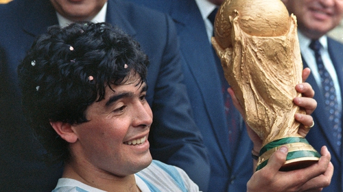 Maradona lifting the World Cup trophy in 1986
