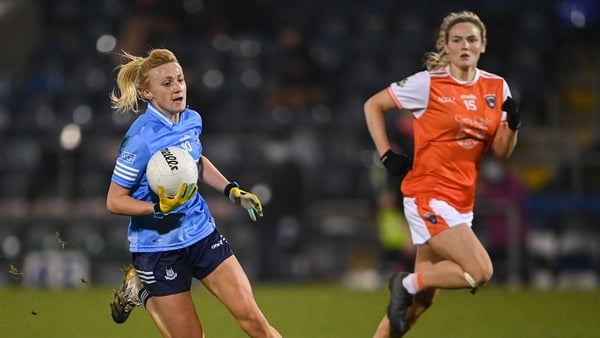 Carla Rowe evades the challenge of Armagh's Eve Lavery