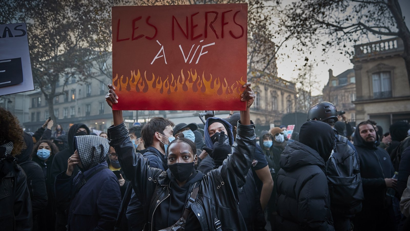 French protesters clash with police over security law