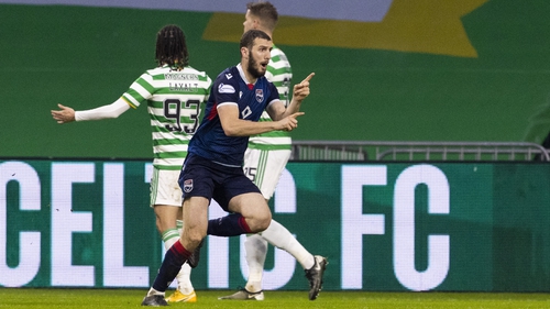 Ross County's Alex Iacovitti celebrates making it 2-0 at Celtic Park