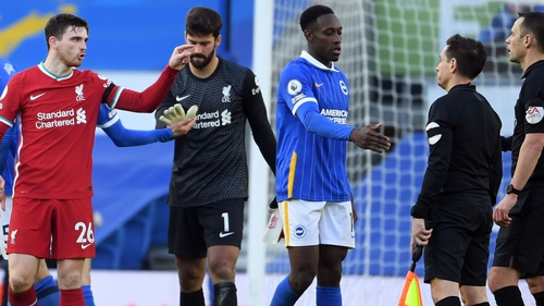 Andy Robertson (left) fell foul of VAR during Liverpool's draw with Brighton