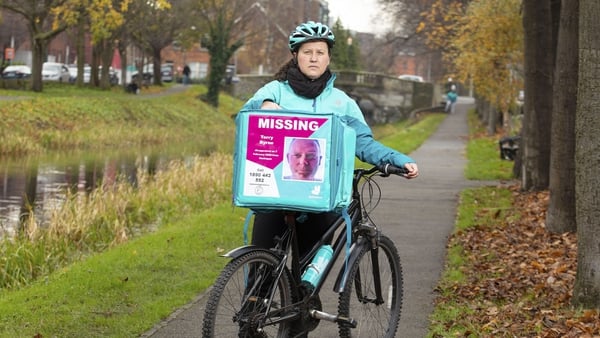 Deliveroo rider with a food delivery bag showing a picture of Terry Byrne who was 45 when he disappeared from his home on 7 February 2020 in Dunboyne, Co. Meath.