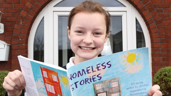 Kasey Earley, 10, reading the new book Homeless Stories