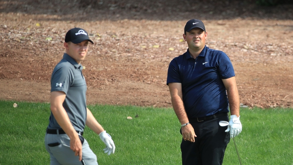 Matthew Fitzpatrick (L) and Patrick Reed are joint leaders along with Laurie Carter