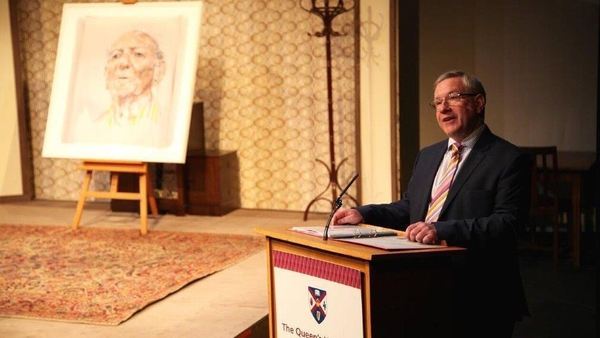 David Grant and, on left, the portrait of Brian Friel by Anthony Palliser