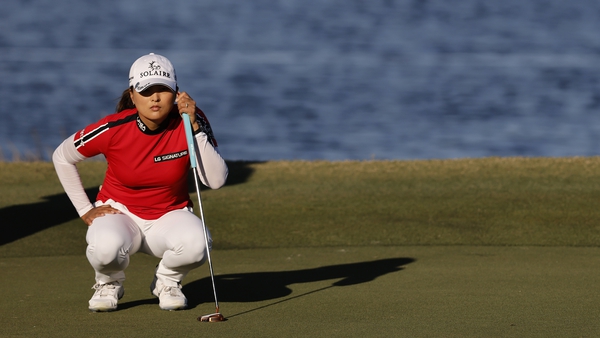 Jin Young Ko of Korea looks over a putt on the 18th green during the second roun