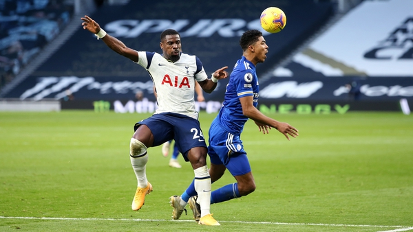 Serge Aurier bundles over Wesley Fofana to give Leicester a penalty.