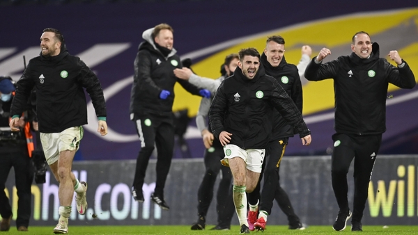 Shane Duffy (L) celebrates at the end of the Cup final shootout.