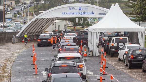 Cars wait in line at a Bondi Beach Covid-19 drive-through testing clinic