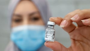 The vaccine, but what's actually inside that little vial? Photo: Getty Images