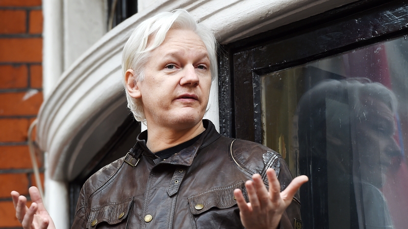 Julian Assange speaks to the media from the balcony of the Ecuadorian Embassy in London in May 2017