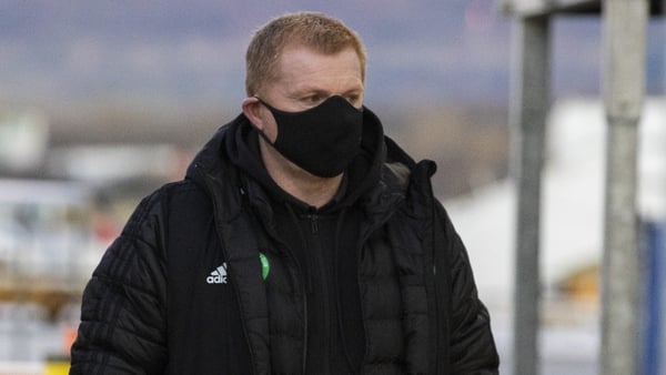 Celtic manager Neil Lennon preparing to board the flight to Dubai on Saturday