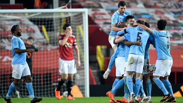 City players celebrate their second goal at Old Trafford