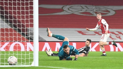 Emile Smith Rowe watches his effort cross the line to set up the Arsenal win