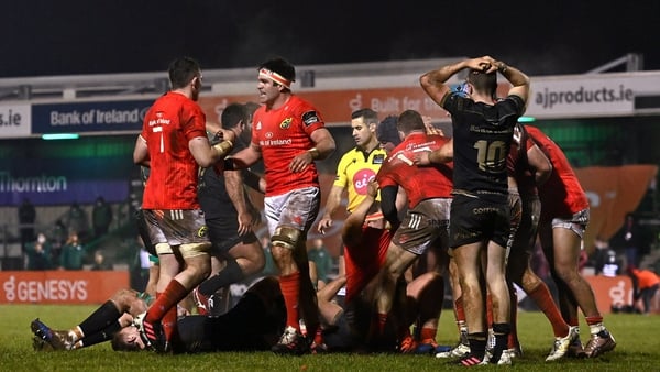 Munster were down to 13 men at the death but held on to win