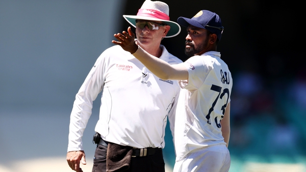 India's Mohammed Siraj alerts umpire Paul Reiffel of the taunting he experienced behind his fielding position