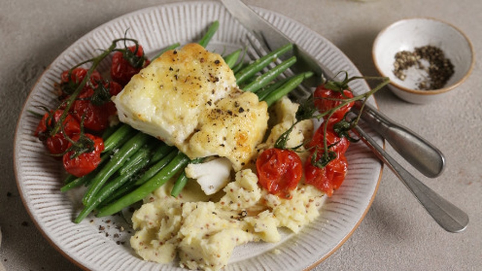 Cheesy cod with cherry tomatoes & mustard mash OT
