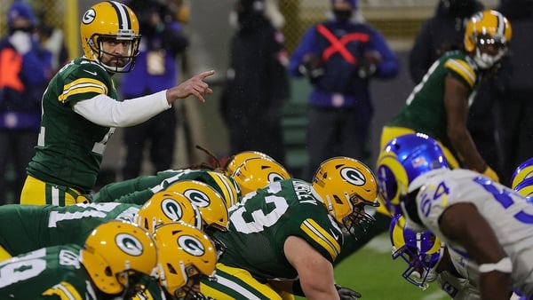 Aaron Rodgers of the Green Bay Packers calls a play