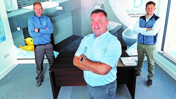 Alan O'Sullivan, CEO of Bathrooms 4U with Seamus Scanlon (left), Director, and Alan Kelly (right), Sales Manager