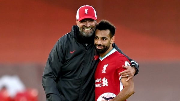 Jurgen Klopp (L) pictured with Mohamed Salah, who is reportedly close to agreeing a new deal with Liverpool