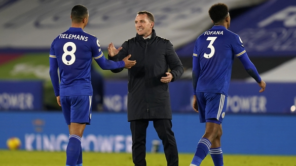 Leicester City manager Brendan Rodgers gestures with Youri Tielemans and Wesley Fofana following the 2-0 defeat of Chelsea