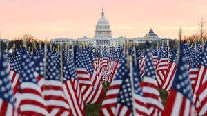 Washington DC's Capitol ahead of the inauguration of Joe Biden and Kamala Harris, with American flags placed alomg the National Mall. Photo: Joe Raedle/Getty Images
