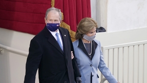 Former President George W. Bush and Laura Bush arrive for the inauguration