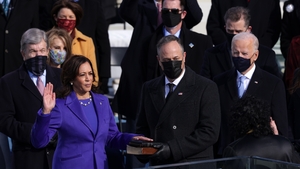 Kamala Harris is sworn in as Vice President as her husband Doug Emhoff looks on