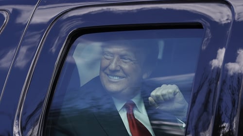 Donald Trump was greeted by supporters on the route to his home in Florida