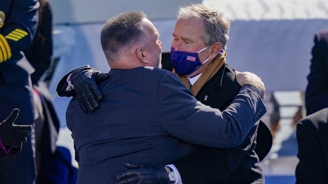 Garth Brooks Hugs George W Bush after the singer's performance of Amazing Grace