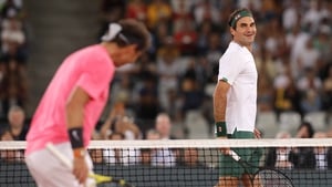 Roger Federer is tied with Rafa Nadal (l) for Grand Slam titles