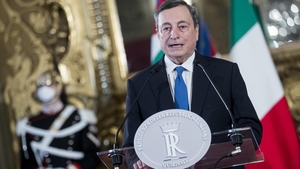Mario Draghi delivers a speech after talks with Italian President Sergio Mattarella