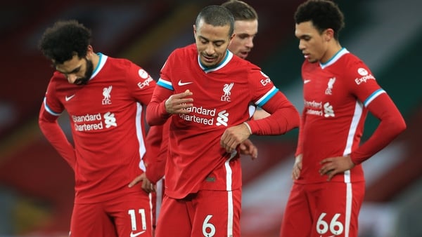 Liverpool players in dejected mood at Anfield