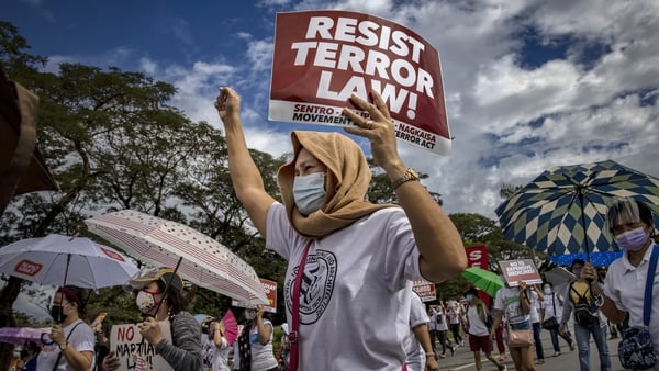Filipinos take part in a protest over a new anti-terrorism law in November 2020