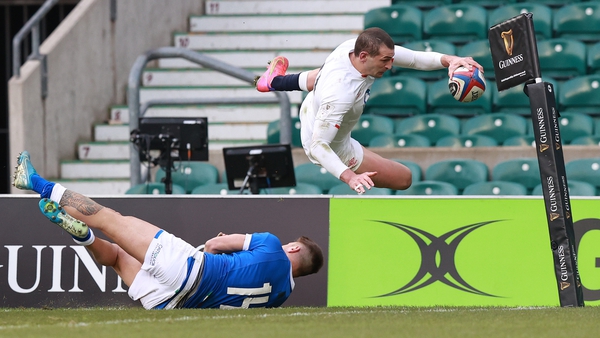 Jonny May dives over Luca Sperandio of Italy to score England's third try
