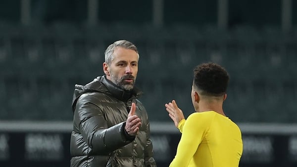 Marco Rose shakes hands with Jadon Sancho of Dortmund after January's match against his Monchengladbach side