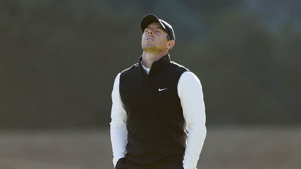Rory McIlroy shows his frustration at the 14th