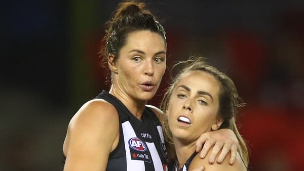 Collingwood's Sharni Norder and Aishling Sheridan celebrate after winning the round four AFLW match