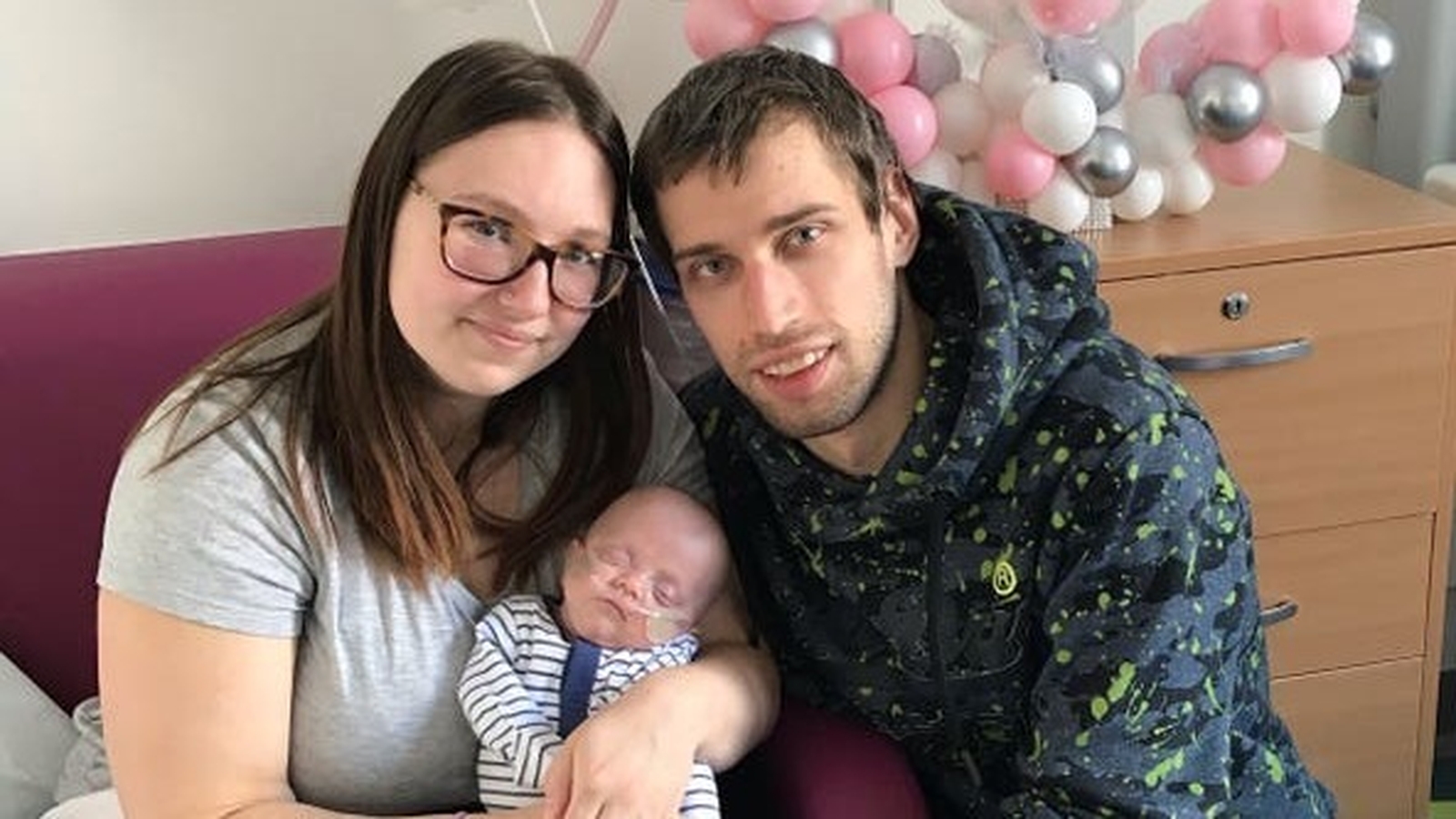 Premature baby born smaller than a hand returns home